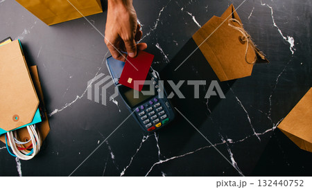 POS for electronic payments and gift bags for Black Friday before Christmas 132440752