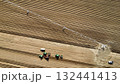 Aerial View of Tractors Preparing Farmland for Planting Season 132441413