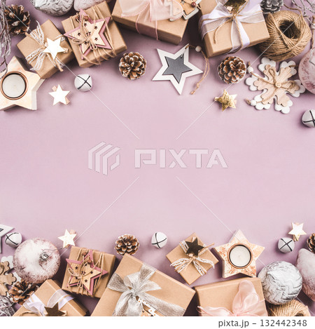 Festive Christmas background with gift boxes and Christmas decorations 132442348
