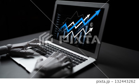 Robotic Hand Operating Laptop Displaying Financial Growth Graph with Arrows and Digital Data Analysis Representations in Dark Environment Scalp 132443262