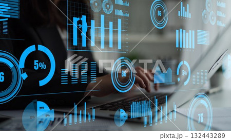 Business professional analyzing data on a laptop with futuristic graphs and charts overlay in modern office environment for insights and strategies xenic Business professional analyzing data on a laptop with futuristic graphs and charts overlay in modern office environment for insights and strategies xenic 132443289