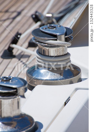 Sailboat winche and rope detail Sailboat winche and rope detail 132443328