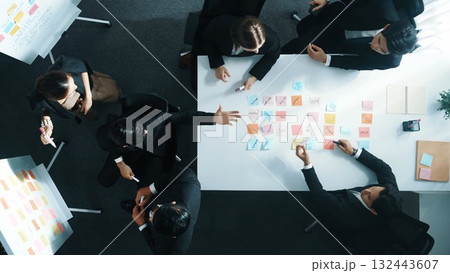 Top down view of business team working together to share idea. Directorate. Top down view of business team working together to share idea. Directorate. 132443607