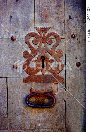 Aged door lock keyhole in Castilla Leon Spain Aged door lock keyhole in Castilla Leon Spain 132444076