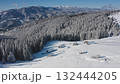 Breathtaking aerial drone revealing serene winter beauty snow covered mountain peaks, dense white blanketed forest, cozy houses nestled among frosty trees. Winter wild nature travel background Breathtaking aerial drone revealing serene winter beauty snow covered mountain peaks, dense white blanketed forest, cozy houses nestled among frosty trees. Winter wild nature travel background 132444205