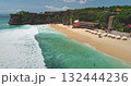 Turquoise waves crashing on Dreamland Beach, Bali, with beach chairs and umbrellas dotting the sandy shore, showcasing the beauty of Indonesia from an aerial perspective Turquoise waves crashing on Dreamland Beach, Bali, with beach chairs and umbrellas dotting the sandy shore, showcasing the beauty of Indonesia from an aerial perspective 132444236