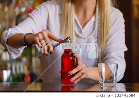 Woman working at the bar counter 132445094