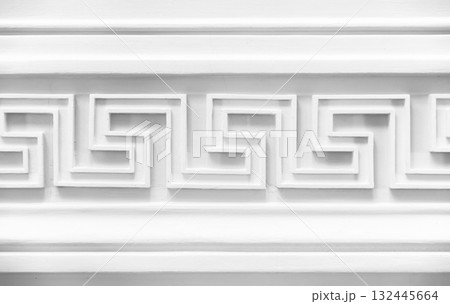 Decoration with white Meander motif. Classic wall moulding, vintage style interior 132445664