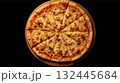 A pizza isolated on black. A round pizza aerial view on a wooden board with a dark background. 132445684