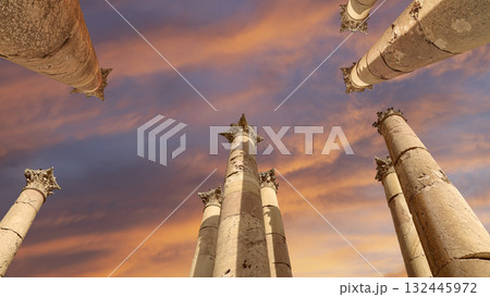 Roman Columns in the Jordanian city of Jerash (Gerasa of Antiquity), capital and largest city of Jerash Governorate, Jordan. Against the background of a beautiful sky with clouds Roman Columns in the Jordanian city of Jerash (Gerasa of Antiquity), capital and largest city of Jerash Governorate, Jordan. Against the background of a beautiful sky with clouds 132445972