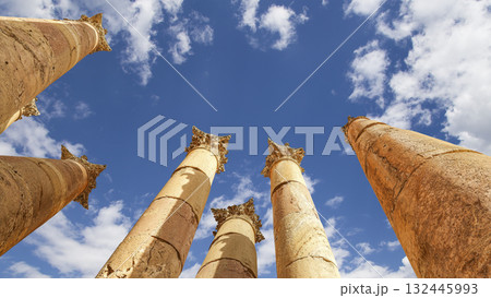Roman Columns in the Jordanian city of Jerash (Gerasa of Antiquity), capital and largest city of Jerash Governorate, Jordan. Against the background of a beautiful sky with clouds 132445993