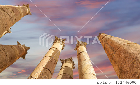 Roman Columns in the Jordanian city of Jerash (Gerasa of Antiquity), capital and largest city of Jerash Governorate, Jordan. Against the background of a beautiful sky with clouds Roman Columns in the Jordanian city of Jerash (Gerasa of Antiquity), capital and largest city of Jerash Governorate, Jordan. Against the background of a beautiful sky with clouds 132446000