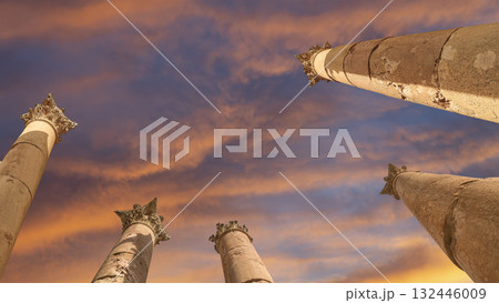 Roman Columns in the Jordanian city of Jerash (Gerasa of Antiquity), capital and largest city of Jerash Governorate, Jordan. Against the background of a beautiful sky with clouds 132446009