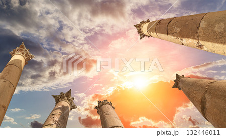 Roman Columns in the Jordanian city of Jerash (Gerasa of Antiquity), capital and largest city of Jerash Governorate, Jordan. Against the background of a beautiful sky with clouds Roman Columns in the Jordanian city of Jerash (Gerasa of Antiquity), capital and largest city of Jerash Governorate, Jordan. Against the background of a beautiful sky with clouds 132446011