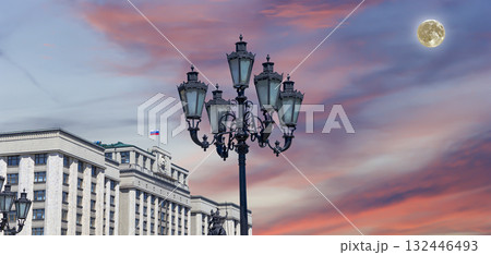 Building of The State Duma of the Federal Assembly of Russian Federation on a beautiful sky with cloud before sunset background (with the super moon), Moscow, Russia 132446493