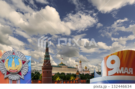 Moscow Kremlin (with decorations for the holiday of May 9 in honor of Victory Day celebration (WWII). Against the sky with clouds, Russia. TRANSLATION: USSR, Victory!, May 9 132446634