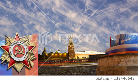 Moscow Kremlin (with decorations for the holiday of May 9 in honor of Victory Day celebration (WWII). Against the sky with clouds, Russia. TRANSLATION: Victory!, Patriotic war Moscow Kremlin (with decorations for the holiday of May 9 in honor of Victory Day celebration (WWII). Against the sky with clouds, Russia. TRANSLATION: Victory!, Patriotic war 132446648