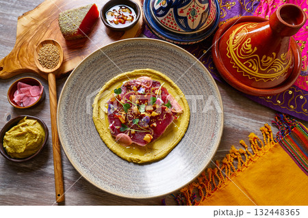 Humus with marinated tuna Moroccan recipe 132448365