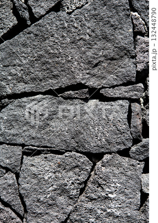 Black lava stone volcanic masonry wall Black lava stone volcanic masonry wall 132448790