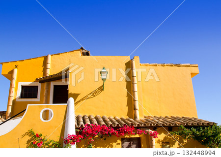 Mediterranean yellow houses in Cala Fornells Mallorca Mediterranean yellow houses in Cala Fornells Mallorca 132448994