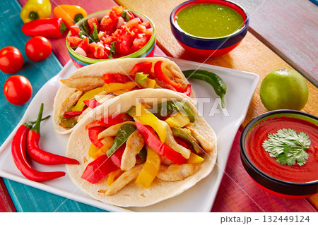 Chicken fajitas tacos mexican food guacamole chili Chicken fajitas tacos mexican food guacamole chili 132449124