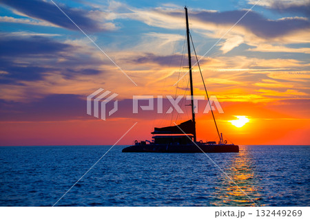 Ibiza san Antonio Abad catamaran sailboat sunset 132449269