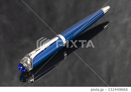 A signature fountain pen on a gray marble background. Gift set. Office decor. 132449668