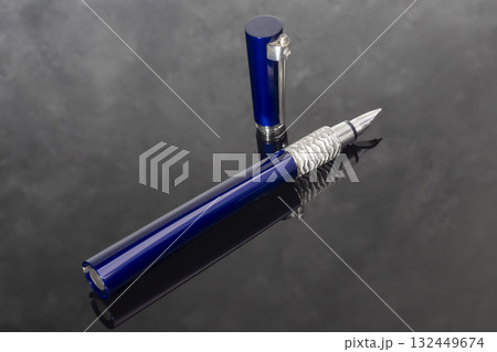 A signature fountain pen on a gray marble background. Gift set. Office decor. A signature fountain pen on a gray marble background. Gift set. Office decor. 132449674