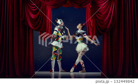 Stage dialogue. Mime and ballerina interacting on stage in colorful costumes. 132449842