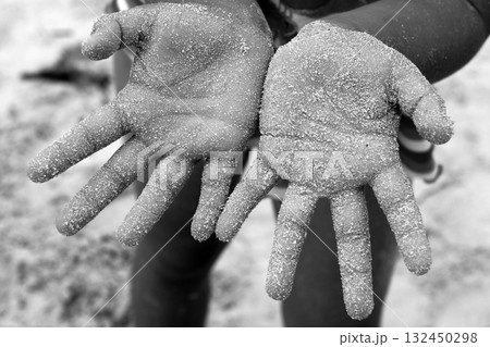 children girl beach sand hands facing camera 132450298