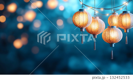 Beautiful illuminated lanterns hanging against a soft blue bokeh background at night Beautiful illuminated lanterns hanging against a soft blue bokeh background at night 132452533