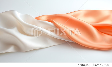 Silky Smooth Orange and White Fabric Draped Elegantly on a Flat Surface for Textural Background 132452890