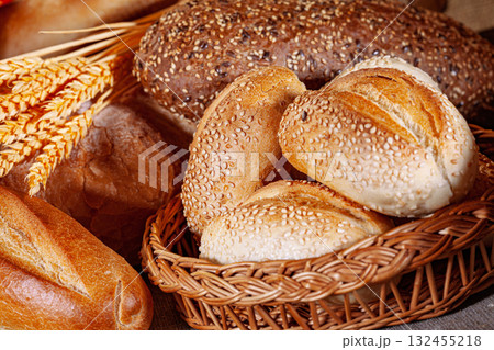 Fresh baked bread. Assorted bakery products loafs of bread and rolls... 132455218