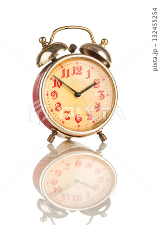Old Analog alarm clock on a white background... Old Analog alarm clock on a white background... 132455254