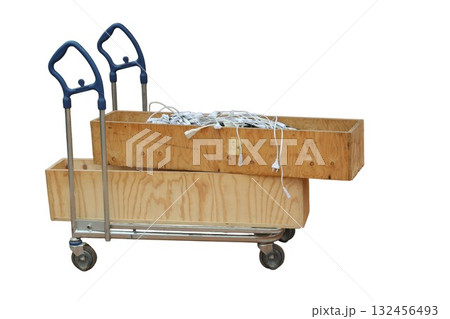 Cart moving wooden boxes with tangled electrical cords Cart moving wooden boxes with tangled electrical cords 132456493