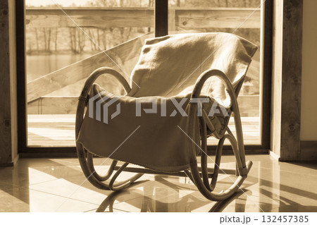 Comfortable armchair with window in background Comfortable armchair with window in background 132457385