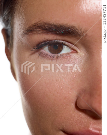 Close-up female face with natural skin texture and clean glowing look Close-up female face with natural skin texture and clean glowing look 132457711