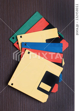 Retro floppy disks on table Retro floppy disks on table 132458011