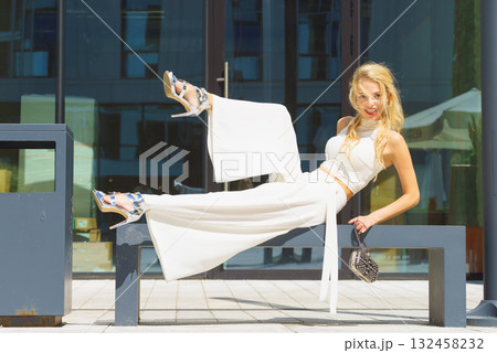 Woman wearing crop top and culottes Woman wearing crop top and culottes 132458232