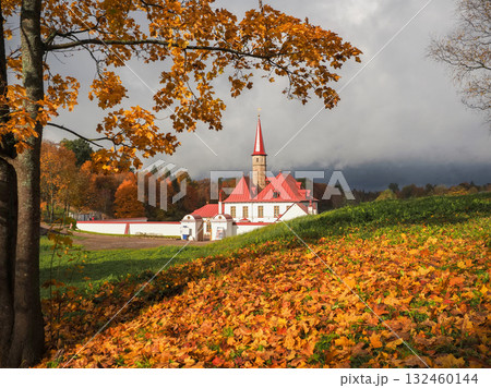 Gatchina Priory Palace. Russia. Golden maples fall in autumn.. 132460144