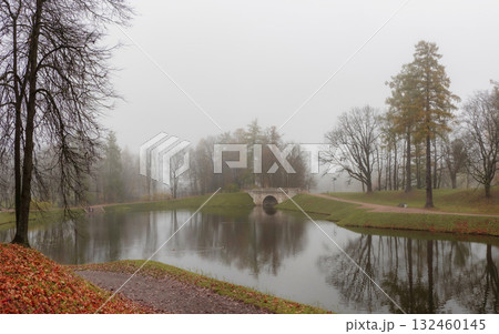 Foggy melancholic autumn city park. Gatchina Foggy melancholic autumn city park. Gatchina 132460145