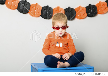 Cute Kids Celebrating Halloween with Pumpkin Buckets and Festive Emotions Cute Kids Celebrating Halloween with Pumpkin Buckets and Festive Emotions 132460437