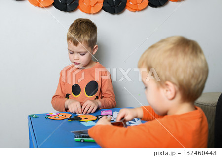 Children Crafting Halloween Decorations at Home Children Crafting Halloween Decorations at Home 132460448