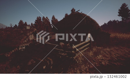 The cottage features a thatched roof and wooden fencing, surrounded by tall trees as dusk sets in, creating a serene countryside atmosphere filled with natural beauty. The cottage features a thatched roof and wooden fencing, surrounded by tall trees as dusk sets in, creating a serene countryside atmosphere filled with natural beauty. 132461002