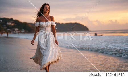 Woman strolls beach at dusk Woman strolls beach at dusk 132461213
