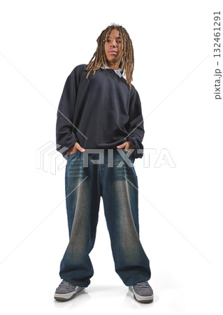 Young man with dreadlocks standing looking at camera Young man with dreadlocks standing looking at camera 132461291