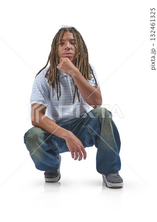 Young black man with dreadlocks looking seriously 132461325