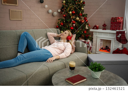 Relaxing at home with festive vibes and peaceful music during the holiday season 132461521