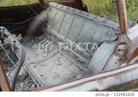 Burned-out car interior close-up consequences of a car fire 132461628