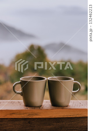 Cozy Autumn Morning with Two Coffee Cups 132462213